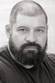 Бред Вільям Хенке